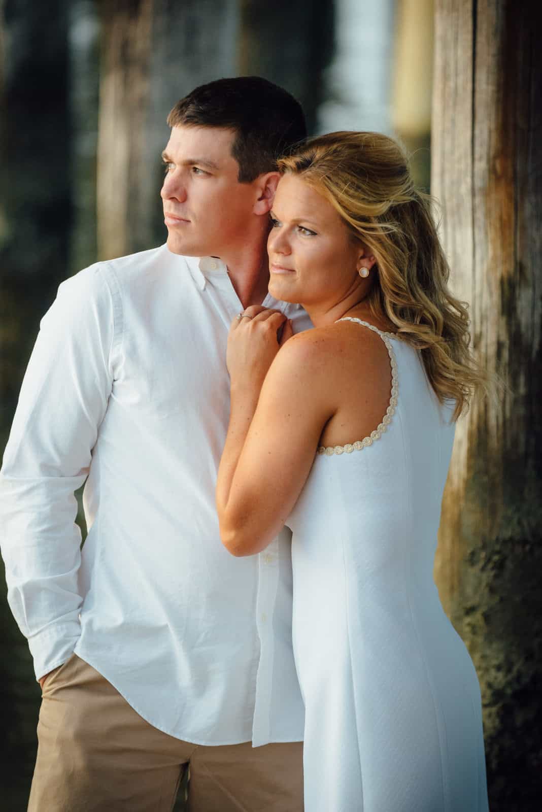 couple is taking a pose for their Lewes Delaware Engagement