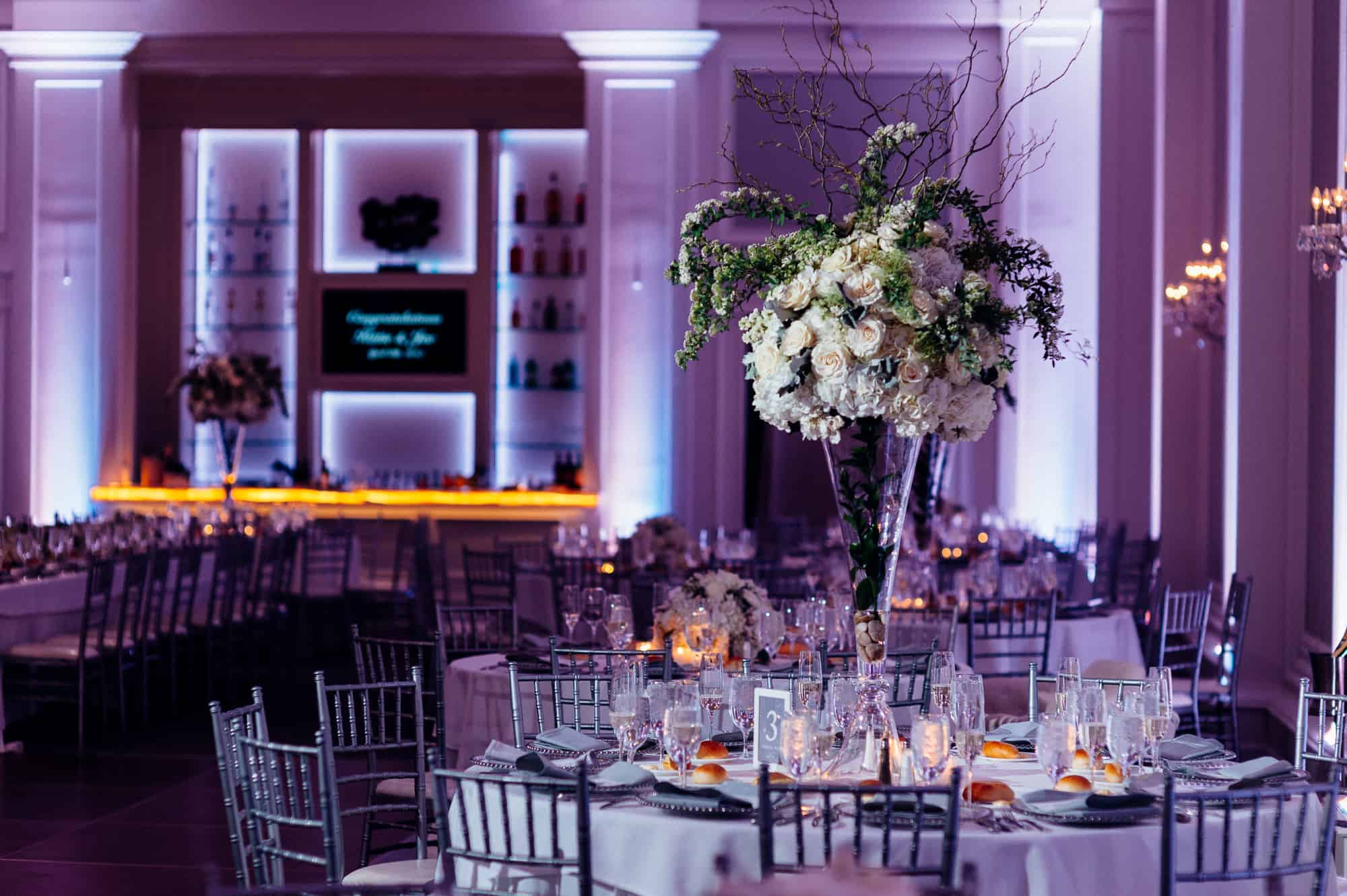 Image of white flower centerpiece at Ballroom at Ellis Preserve