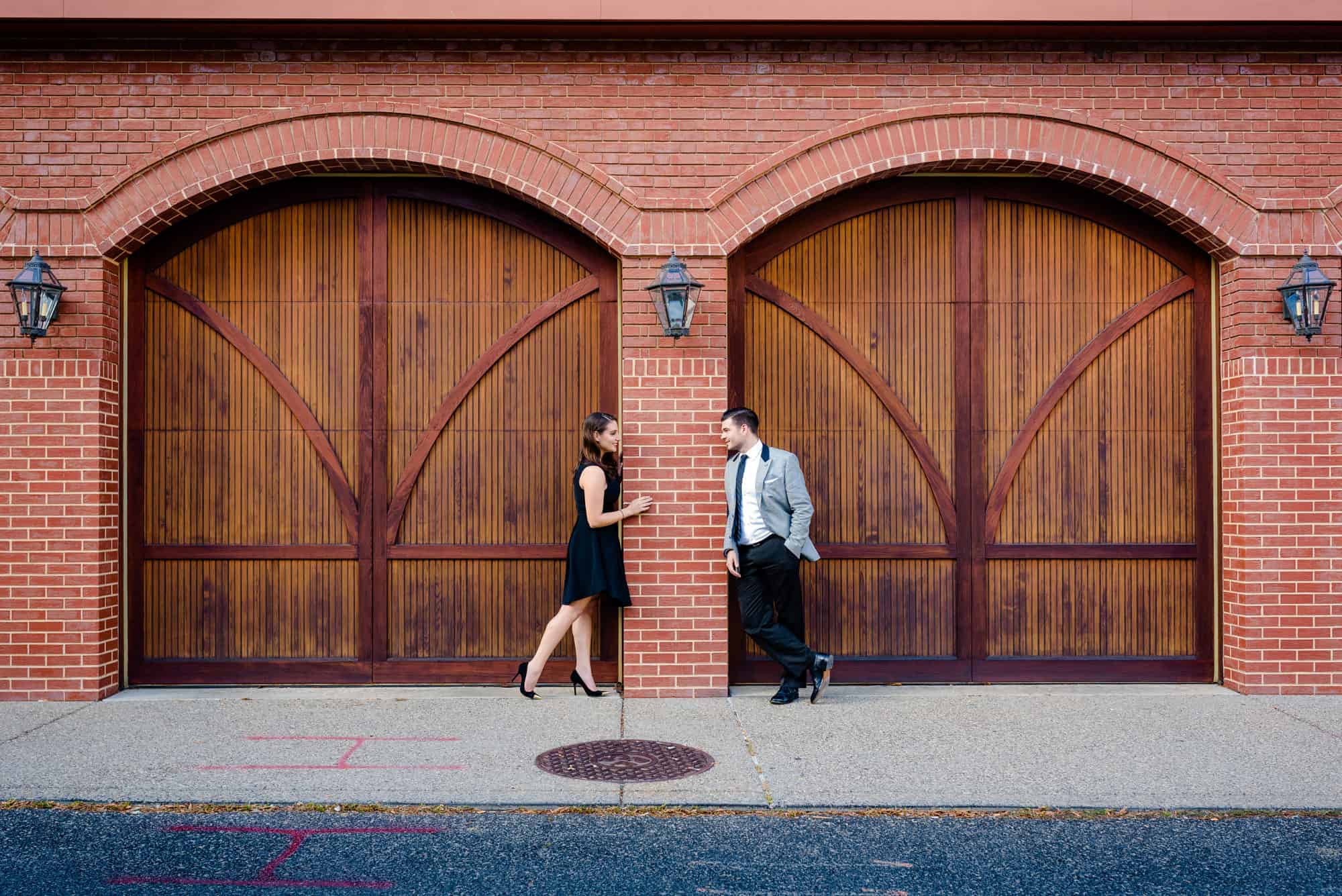 couple posing for their e-session at old city