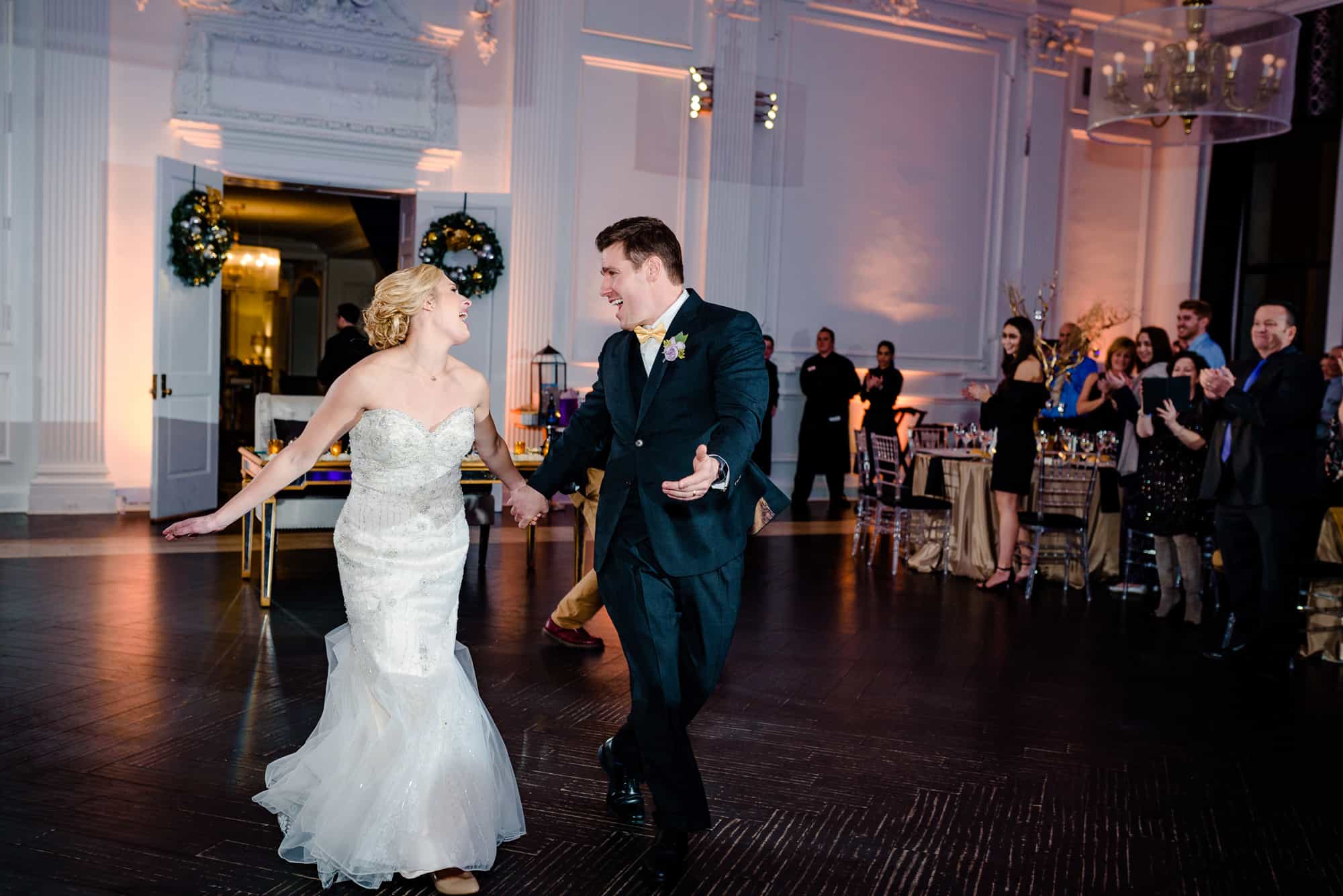 Bride and groom enter recption at the Downtown Club Philadelphia