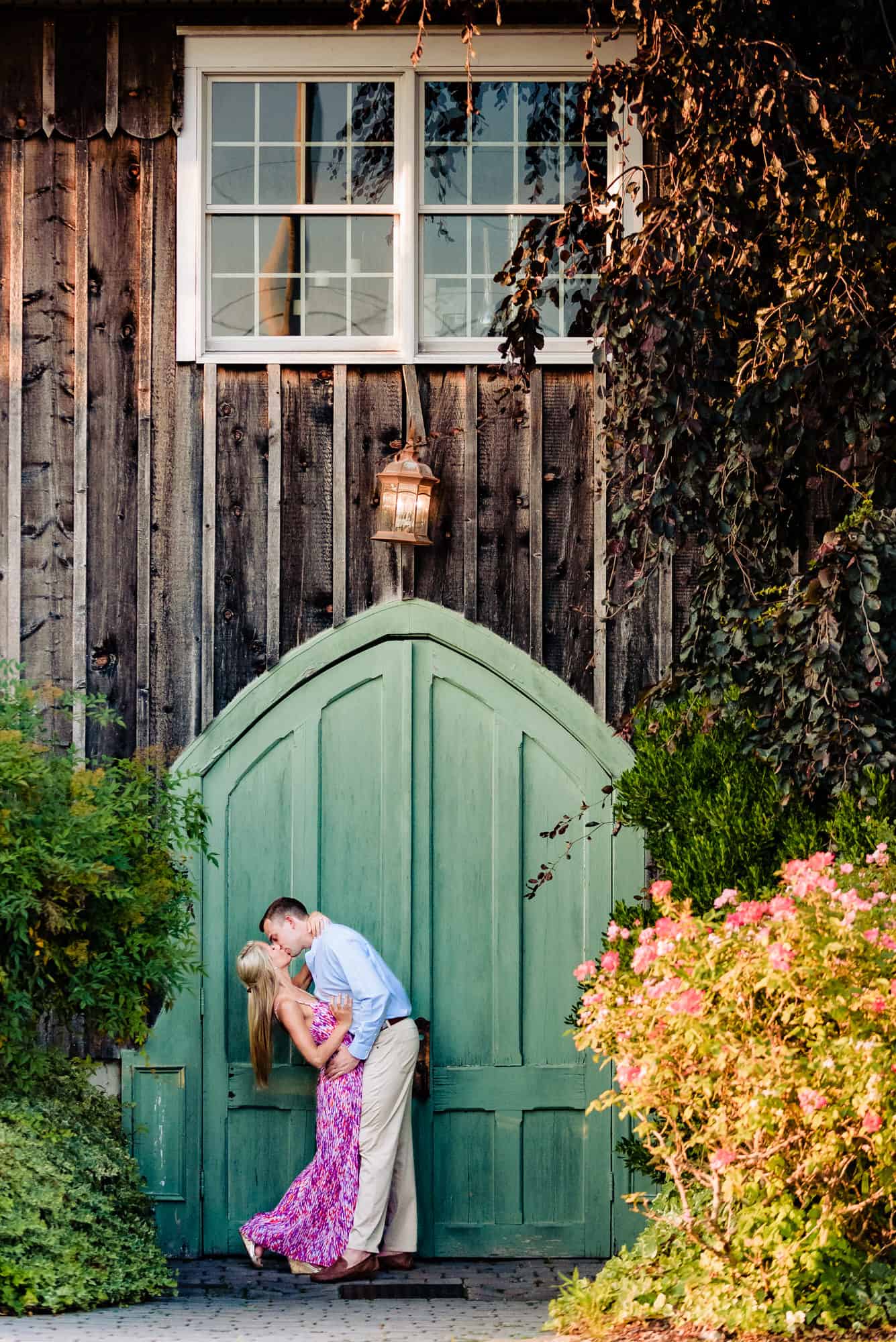 couple kisses during their engagement session