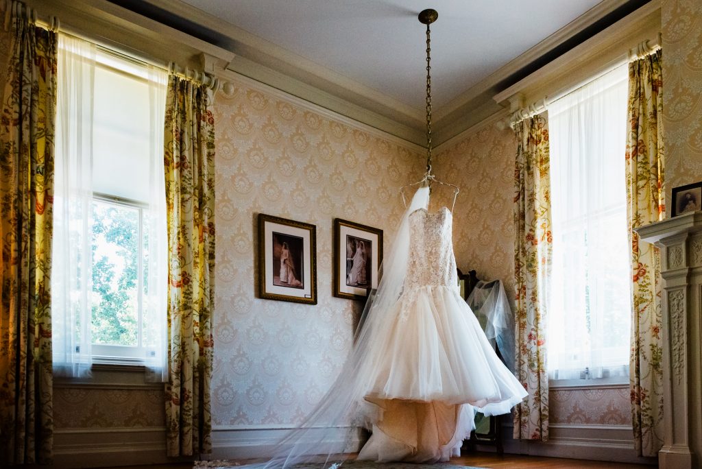 dress hanging from ceiling