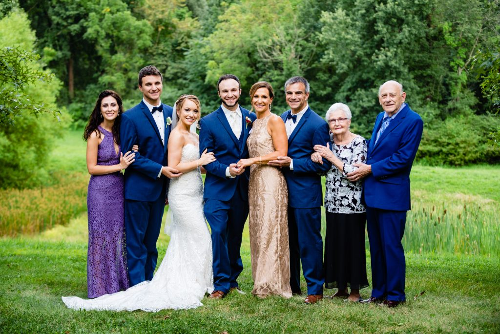 groom with his family shot