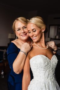 Ritz Carlton Philadelphia Wedding | mother of the bride hugging bride