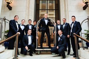 Ritz Carlton Philadelphia Wedding|groom and groomsmen using luggage cart for photo