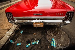Ritz Carlton Philadelphia Wedding|back of red vintage car with just married license plate