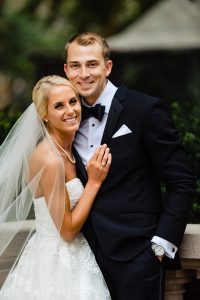 Ritz Carlton Philadelphia Wedding|bride and groom embracing looking at camera