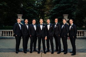groomsman group photo in city park