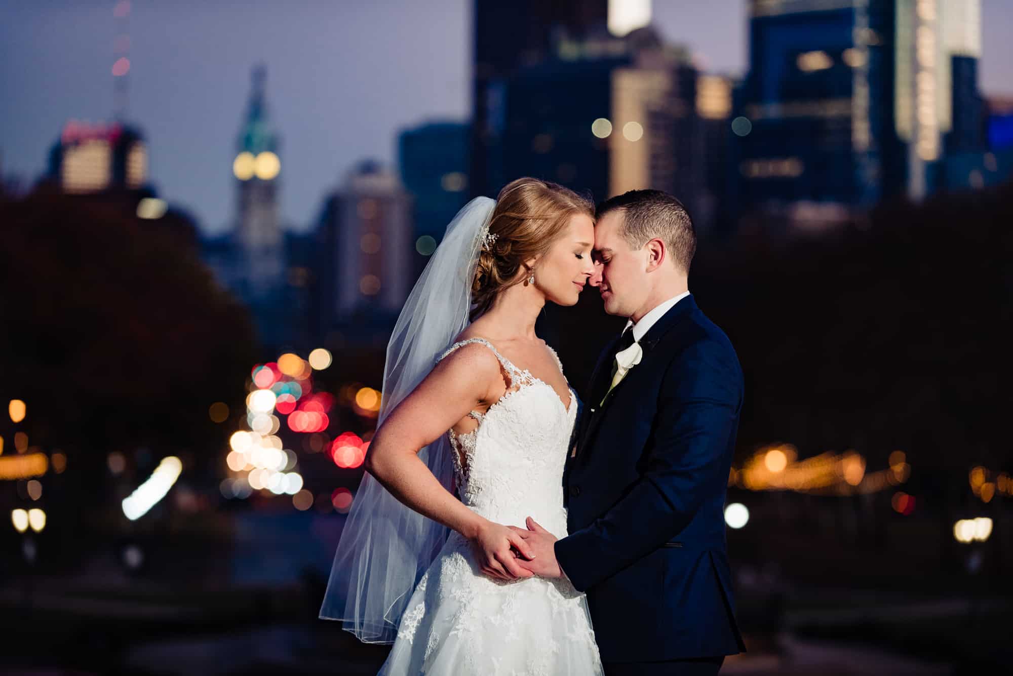 Nightshot of bride and groom on the steps of the Philadelphia Museum of Art