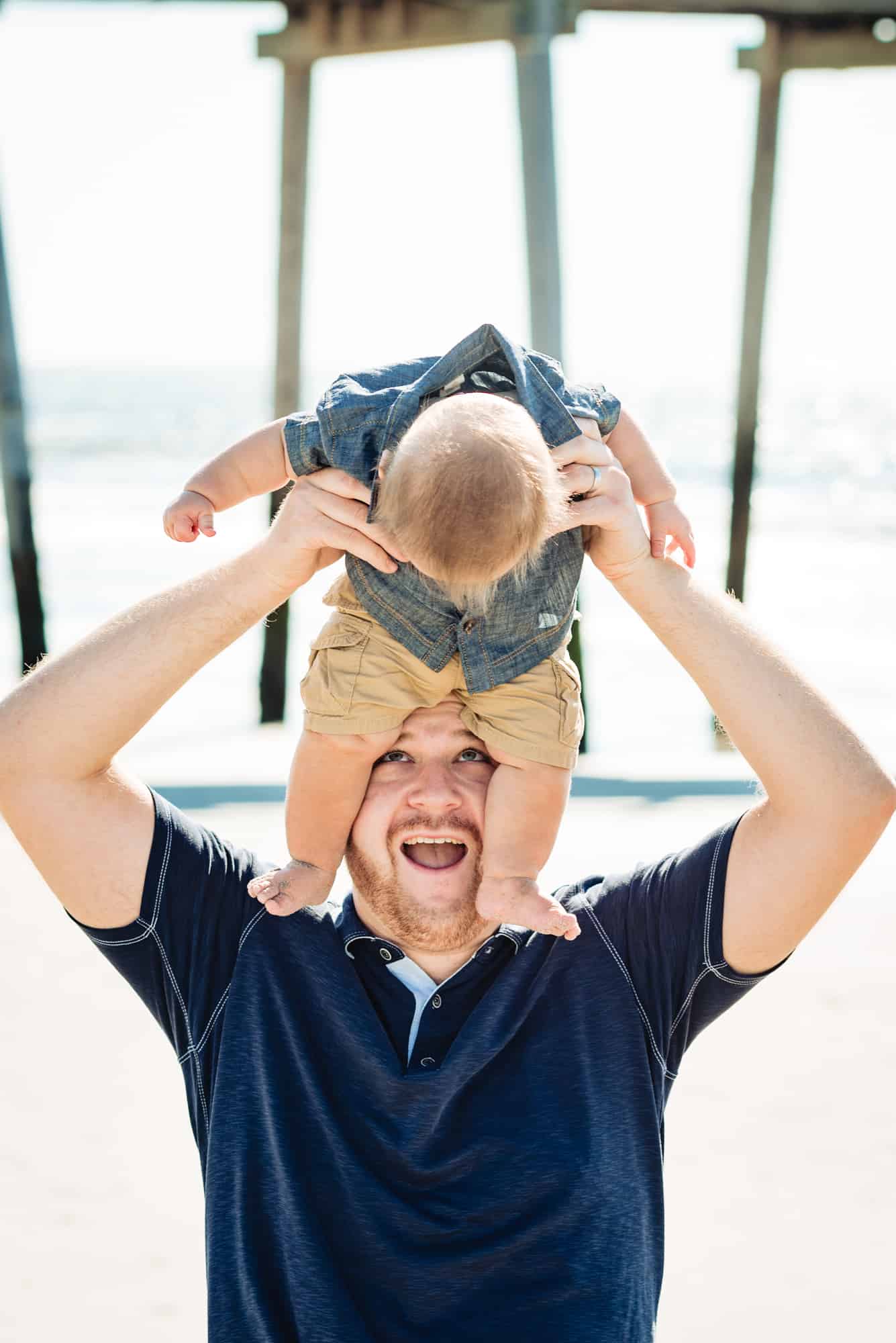 dad and baby son laughing during their Family Photo Session