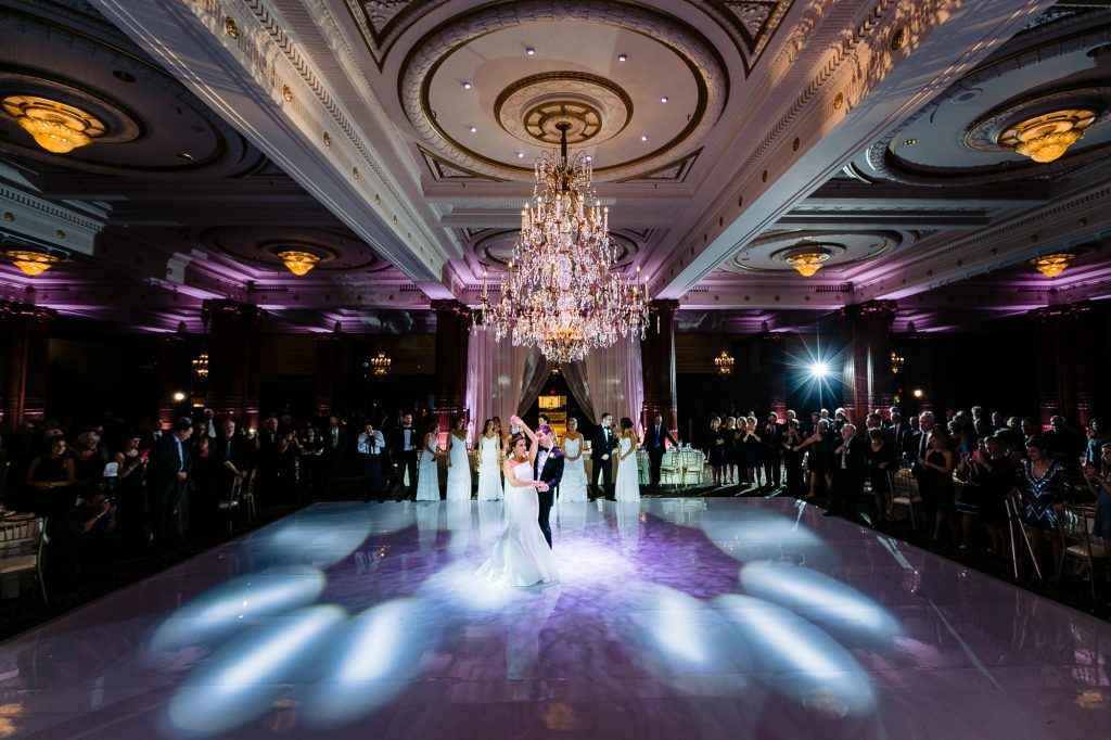 long shot f the bride and groom's first dance