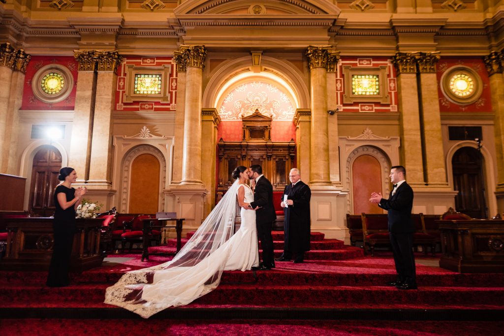 bride and groom kiss at end of ceremony