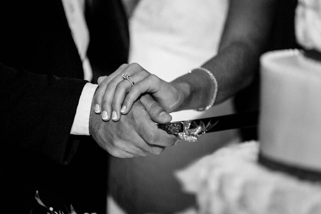 cutting wedding cake image