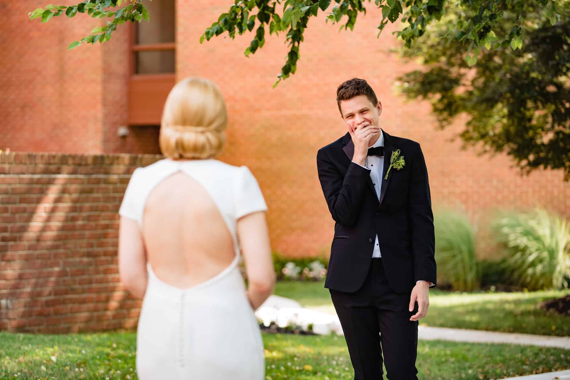 grooms first look at the bride