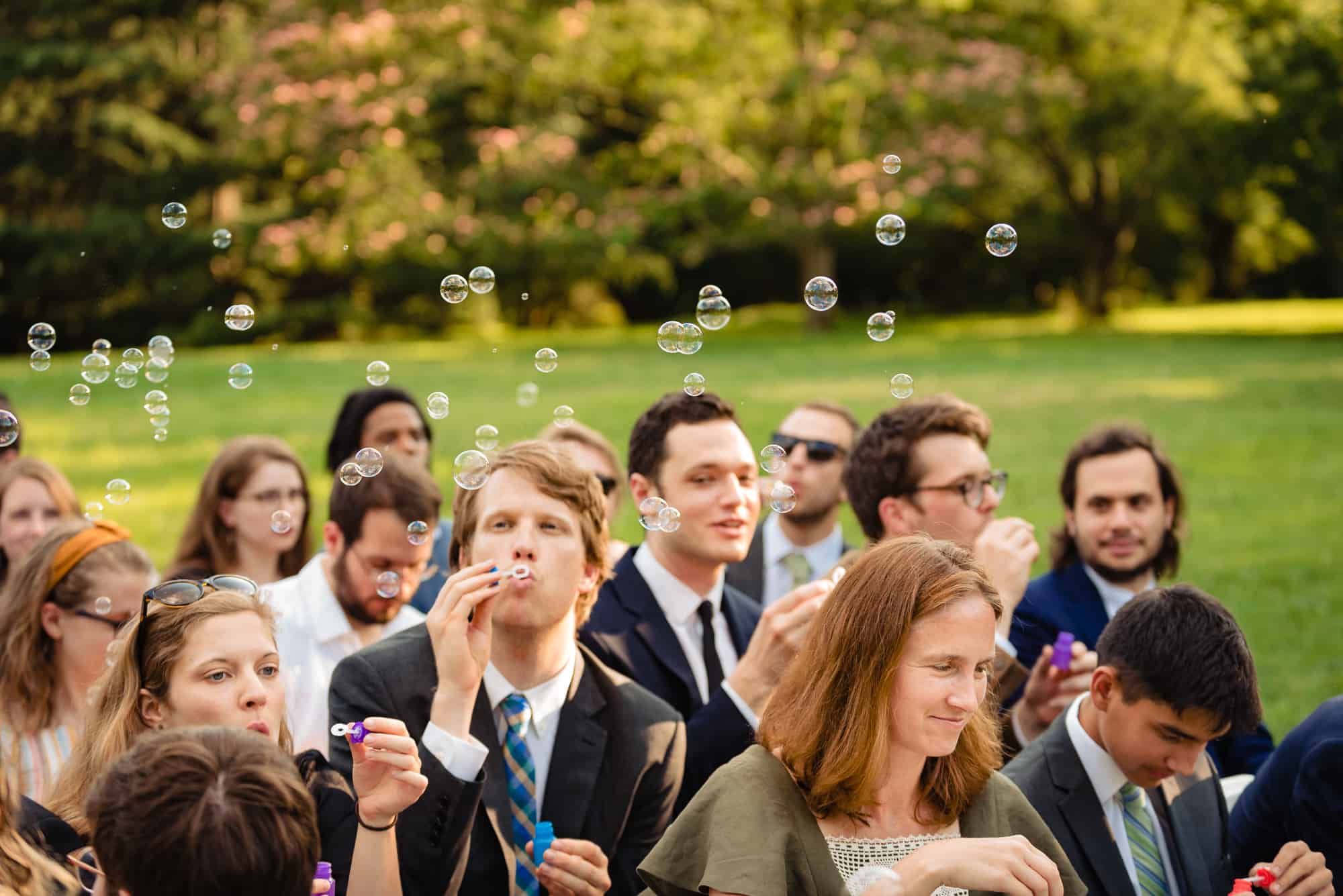 guests blowing bubbles