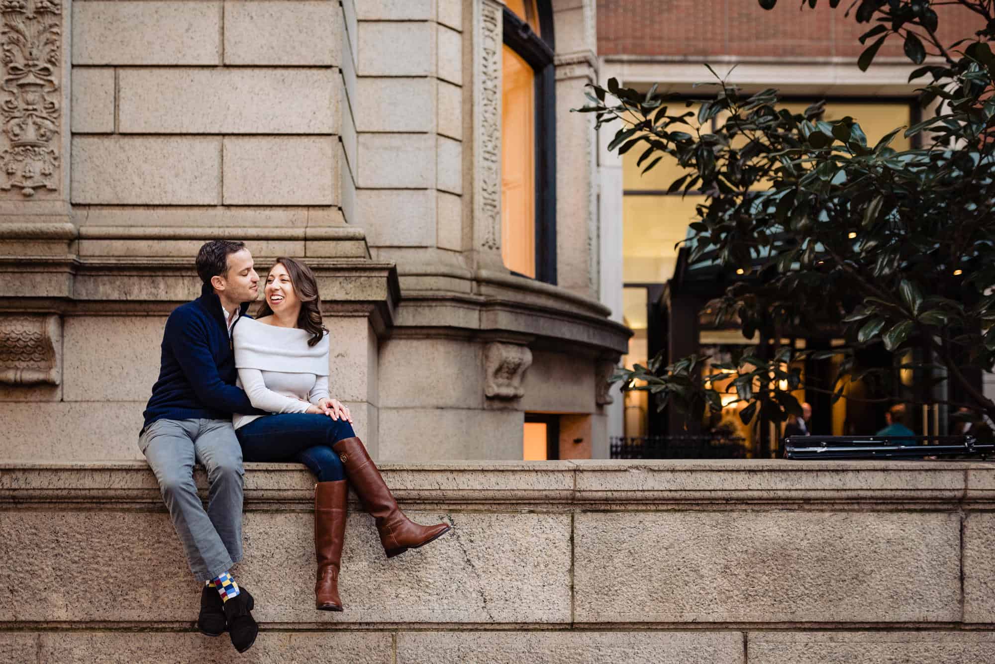 couple taking a pose in casual clean attire during their engagement session