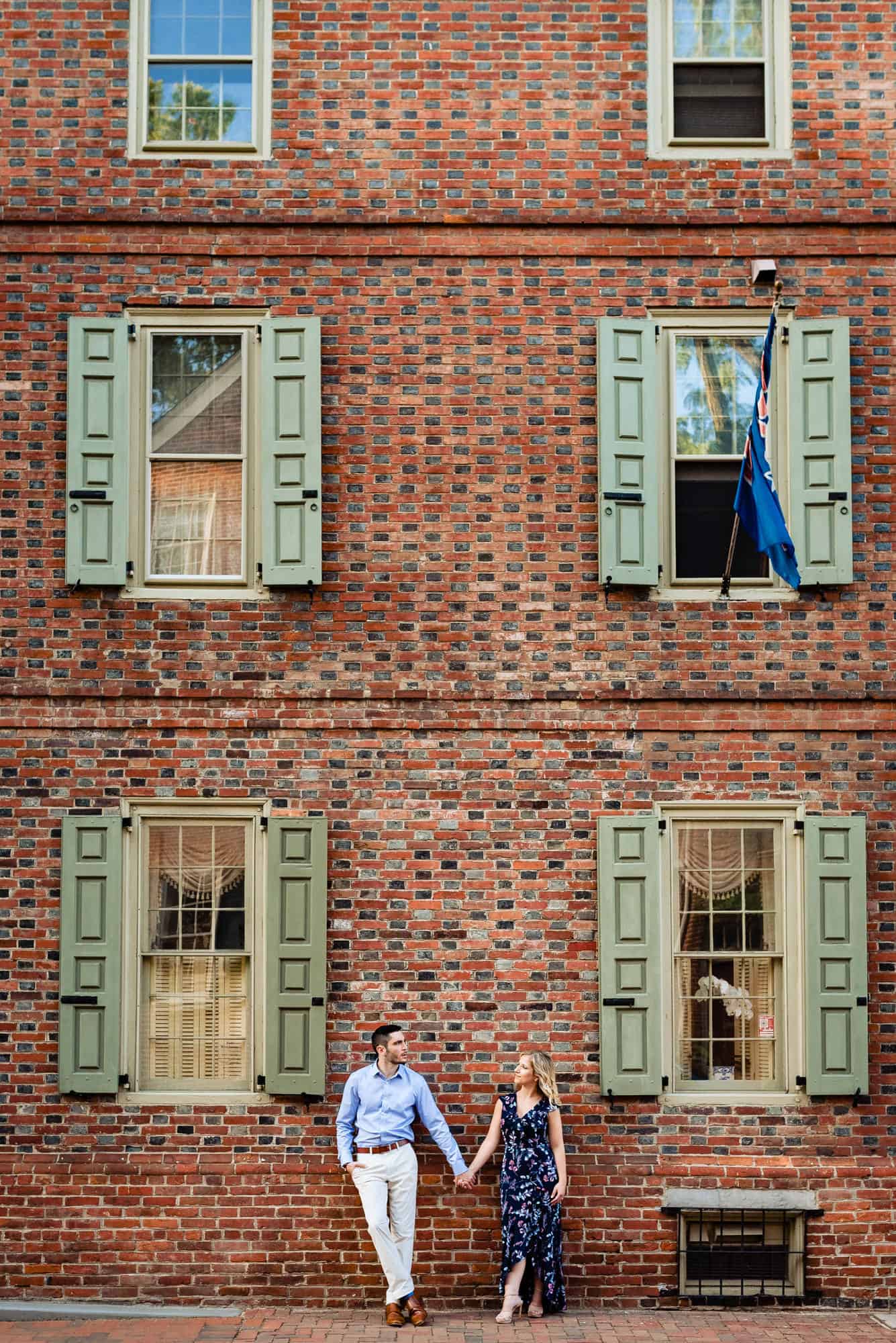 Engagement Photos of a couple taken outside their neighborhood