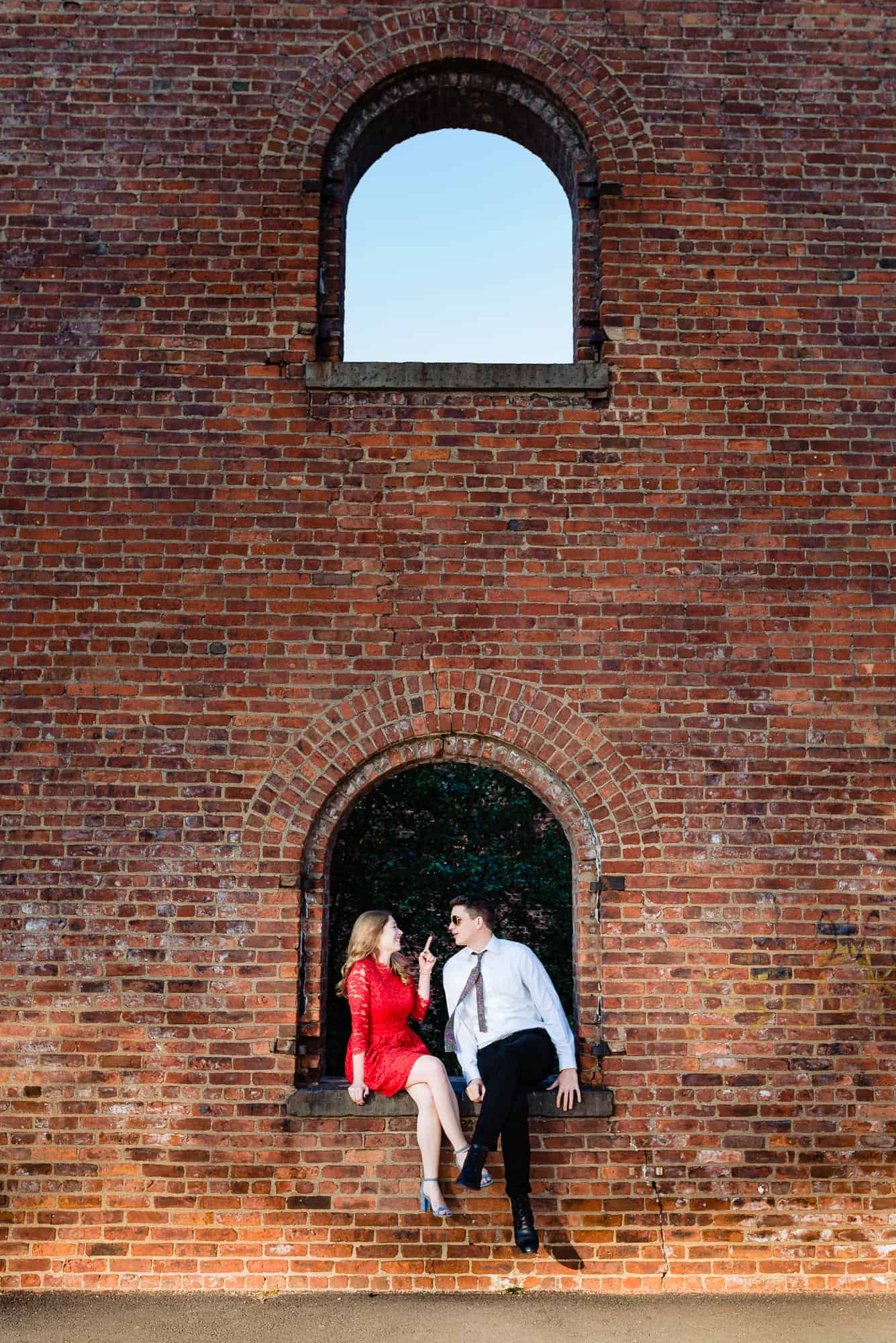 couple poses for their dumbo e-session