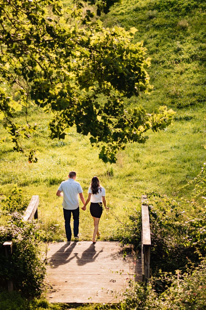 back shoot of the couple walking on their longwood gardens eshoot