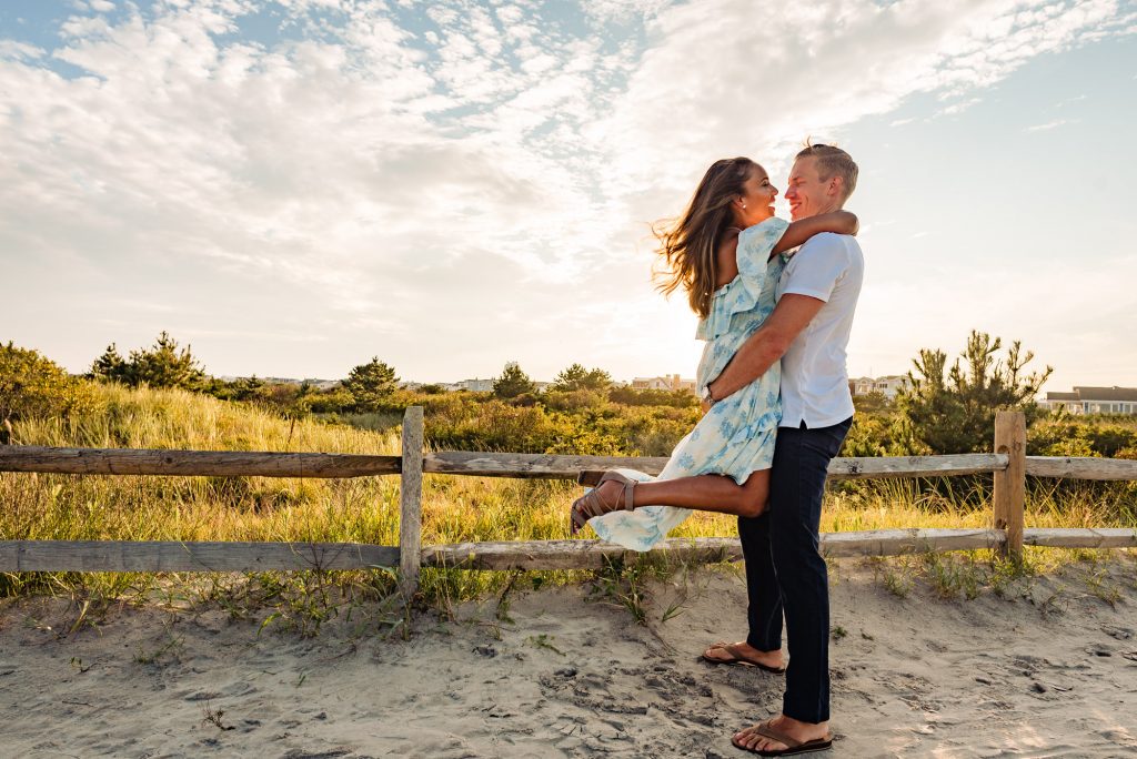 kyle picking up tiff on the beach avalon nj e-session