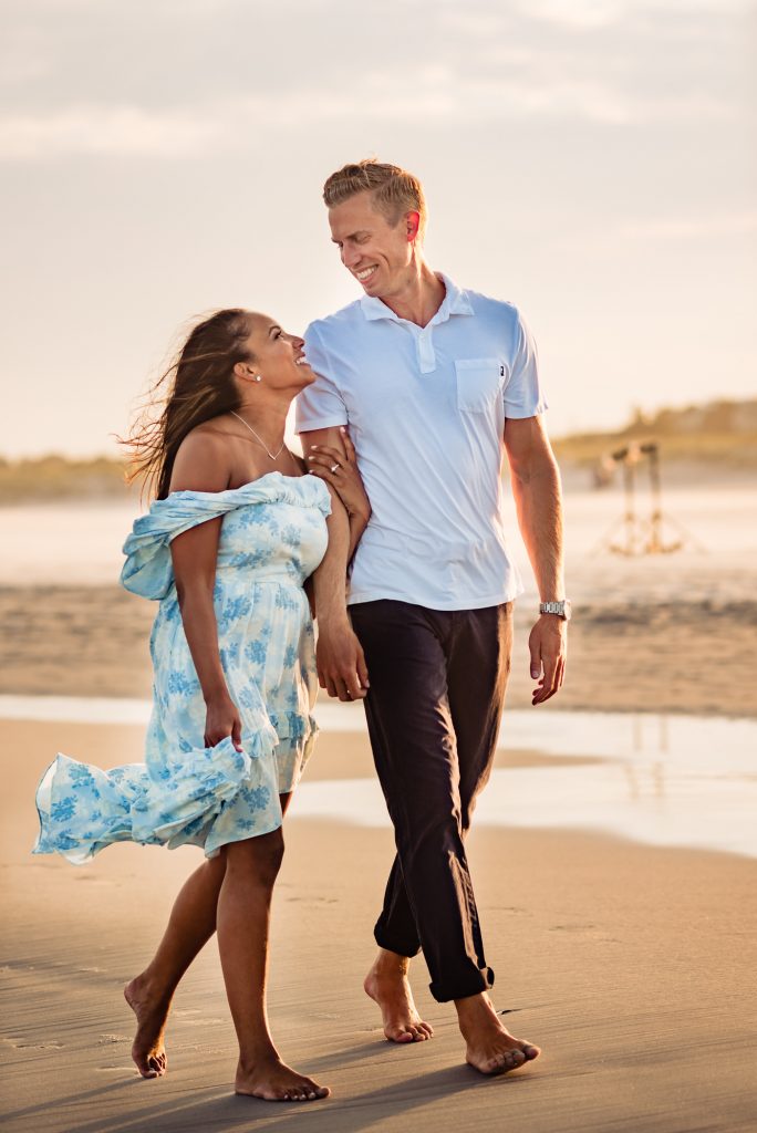 tiff & kyle walking on the beach