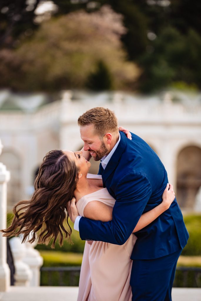 couple kisses for their Longwood Gardens Spring e-session