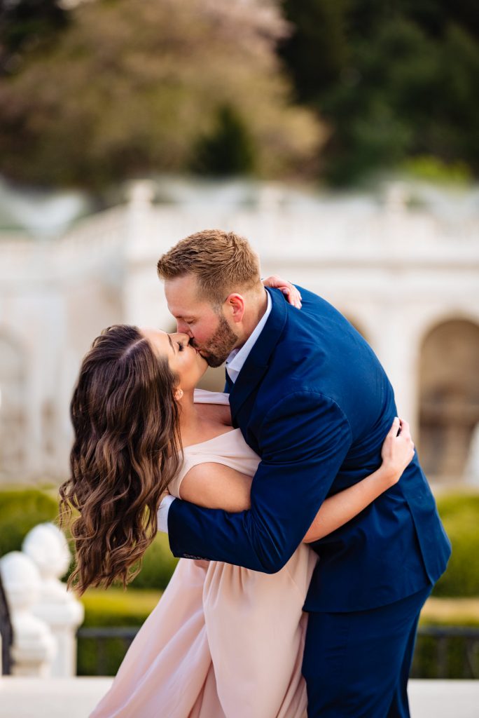 couple kisses for their Longwood Gardens Spring e-session