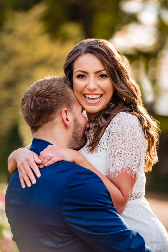couple taking a pose during their Longwood Gardens Spring e-session
