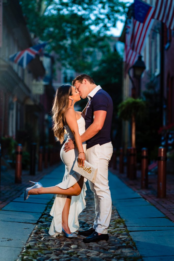 couple is taking a pose for their classic philly e-session