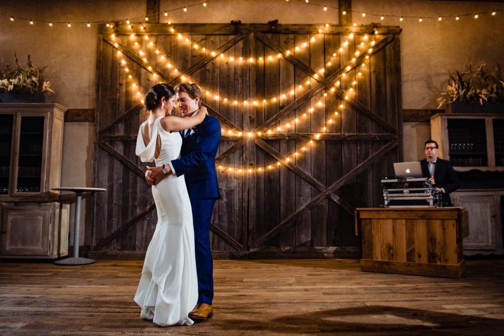 the newlywed's first dance at their terrains garden wedding