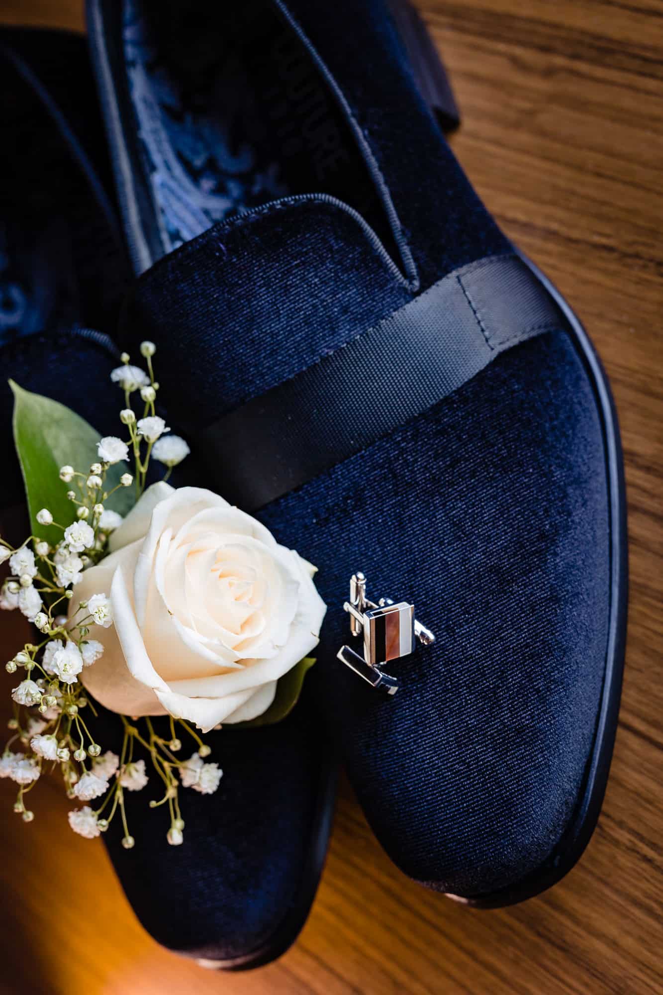 royal blue colored shoes of the groom