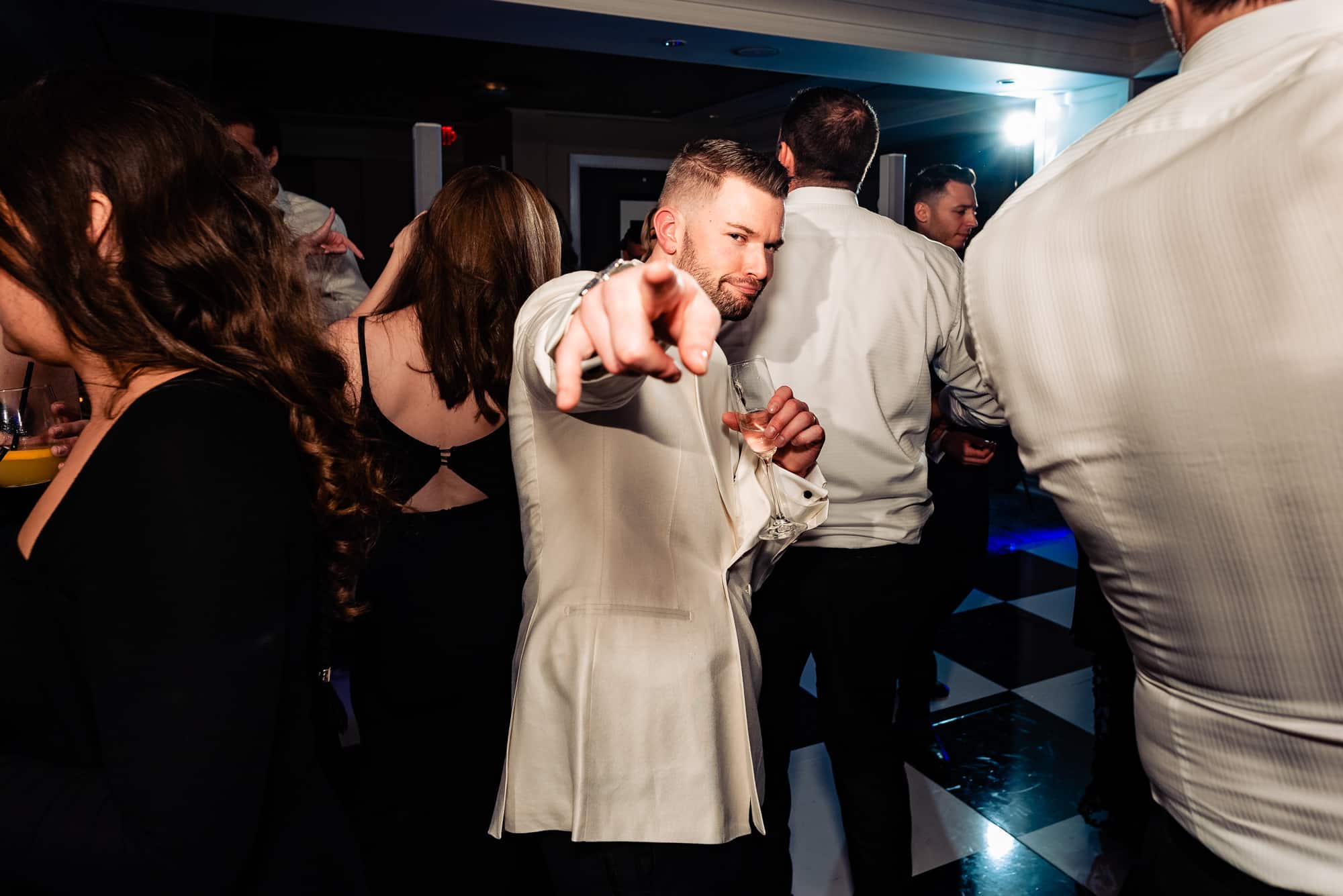 groom enjoying his wedding party