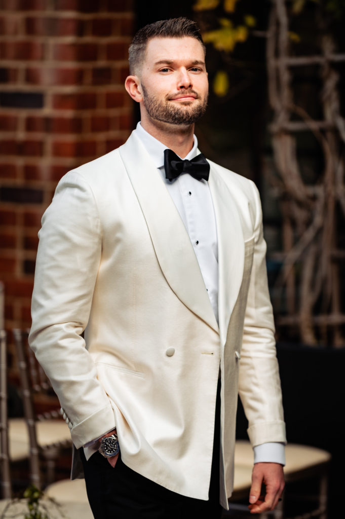 solo shot of the dashing groom