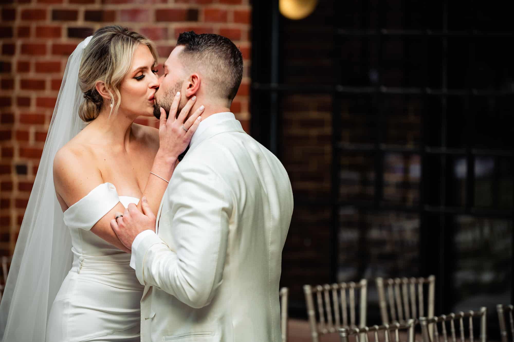 intimate moment between the bride and groom before the ceremony