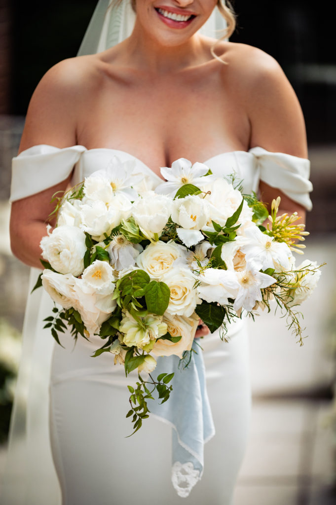 the bride's bouquet made of white roces