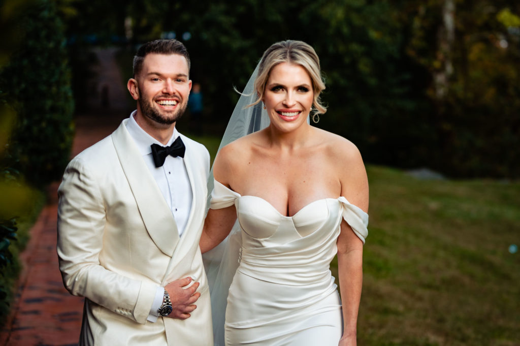 the smiling bride and groom