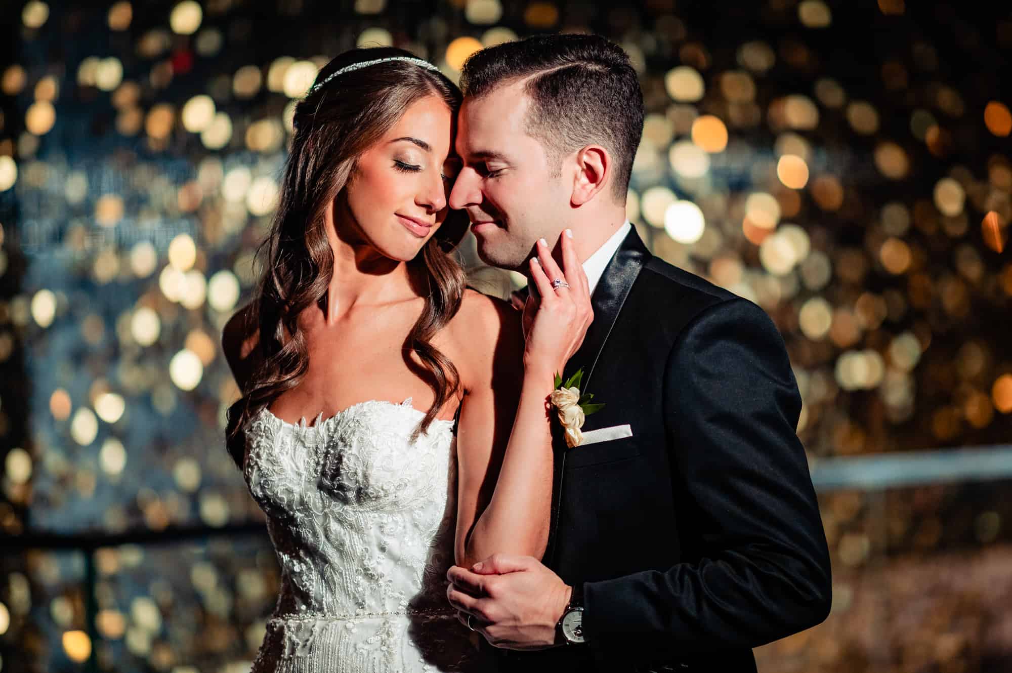 intimate moment of bride and groom embracing at their W Hotel Wedding in Philadelphia