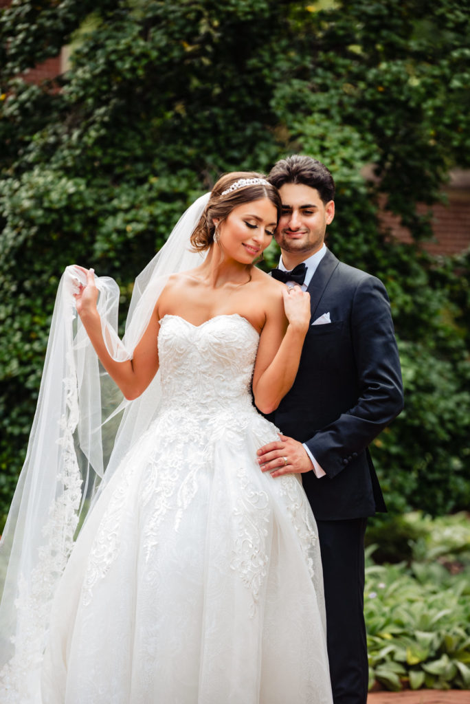The groom holding the bride