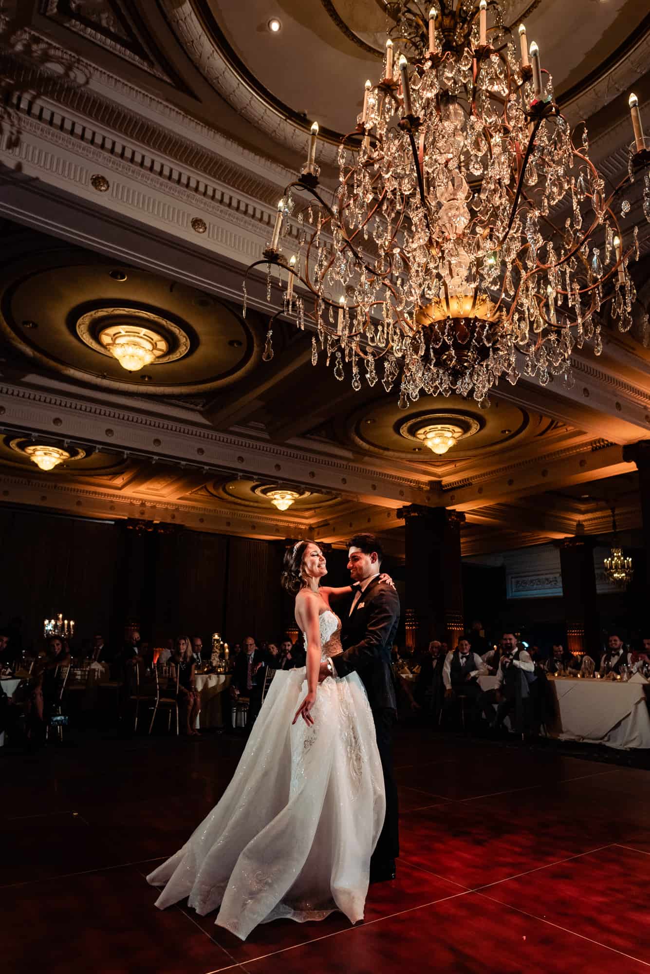 the couple's first dance at the crystal tea room venue