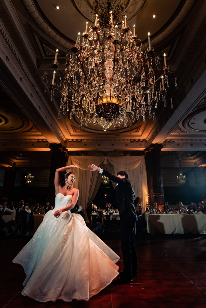 the couple's first dance at the crystal tea room venue
