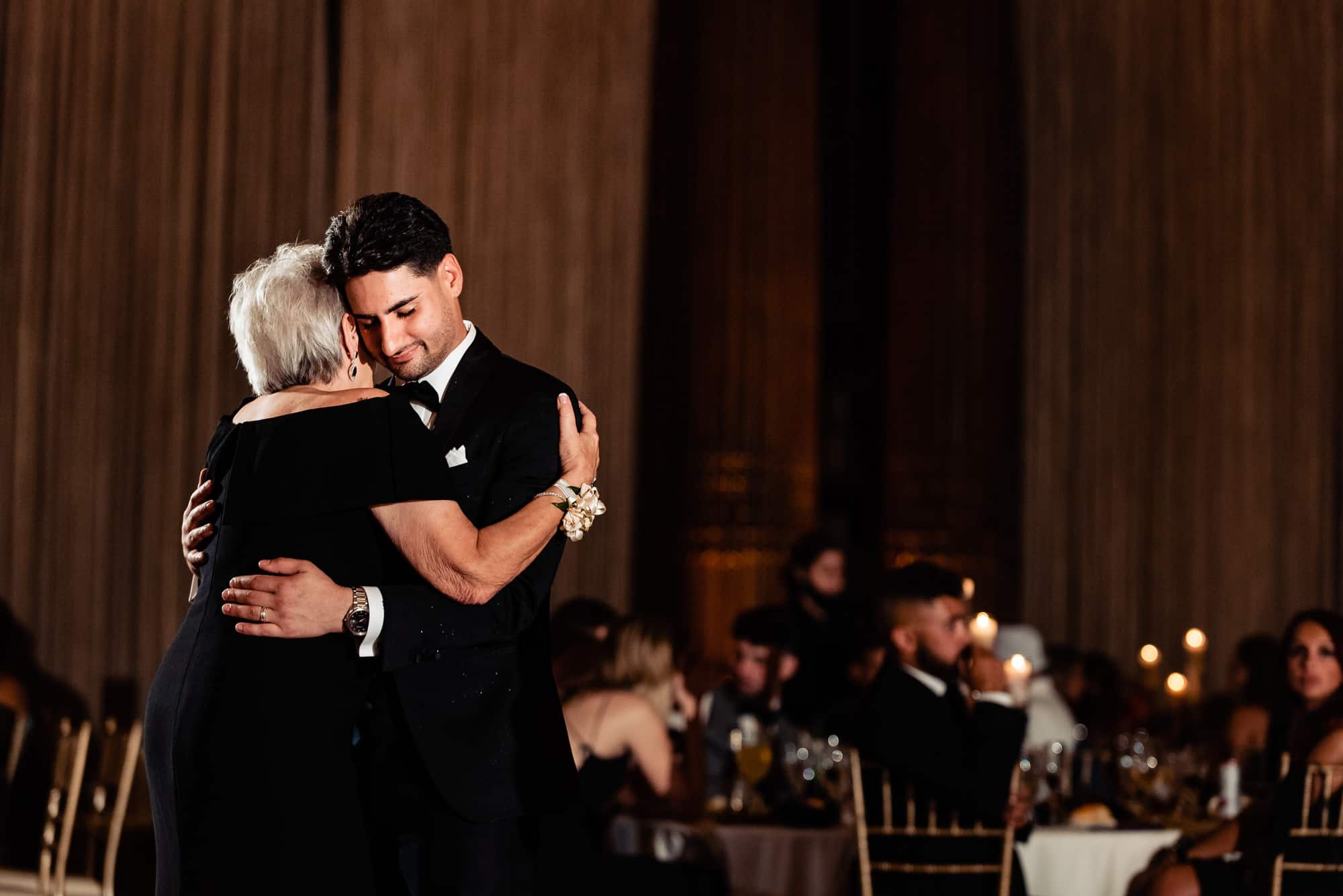 groom dancing with his mother at the crystal tea room wedding venue