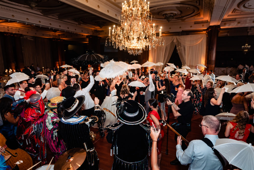 guests having a blast on the dance floor at the crystal tea room wedding venue
