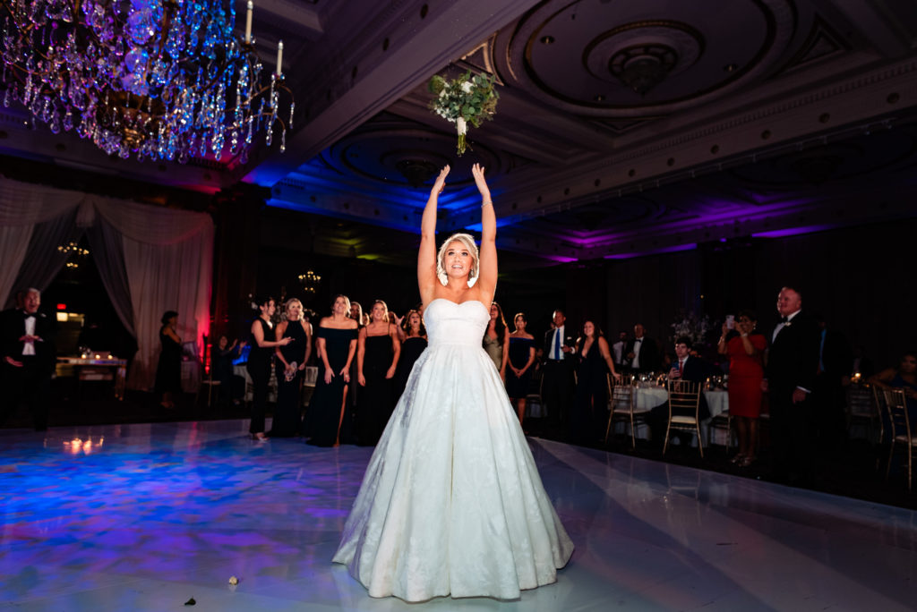 bride tossing her bouquet