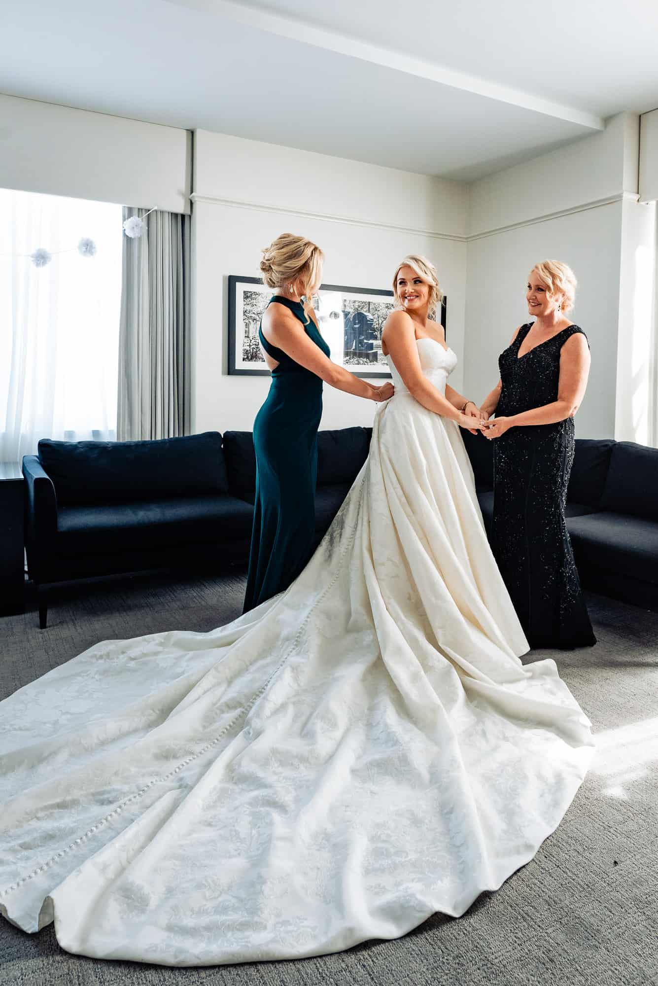 bride and her mother getting ready in her suite at the Crystal Tea Room