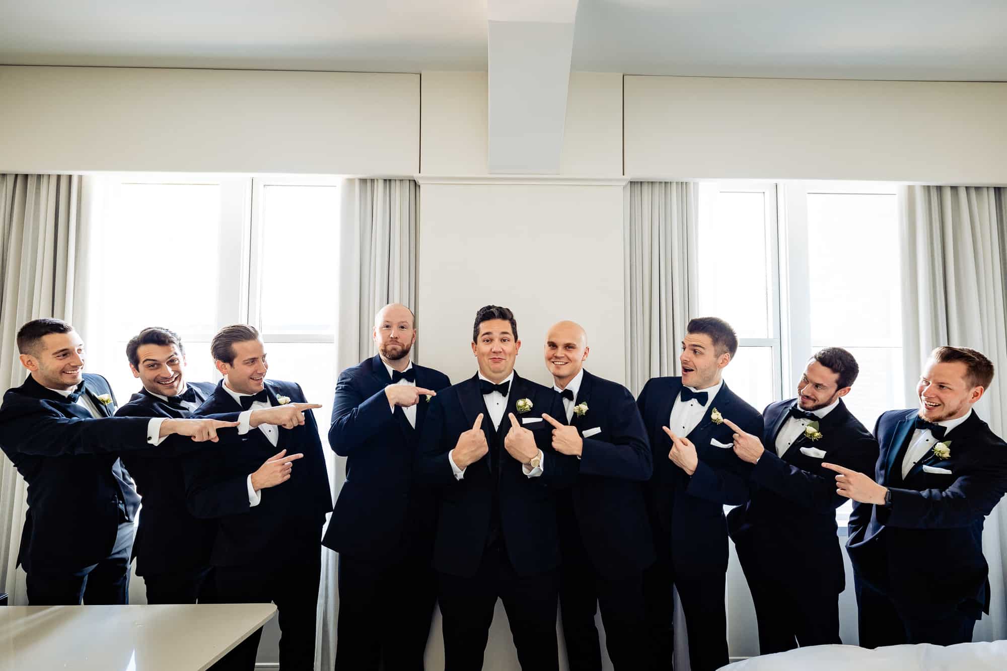 groom and his entourage at Crystal Tea Room