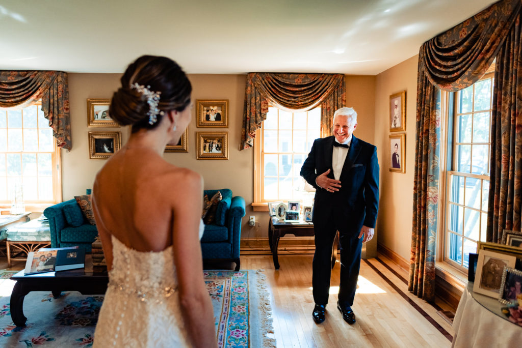 father looking lovingly at her daughter