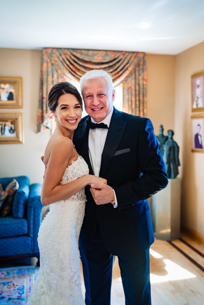 bride and her father smiling together