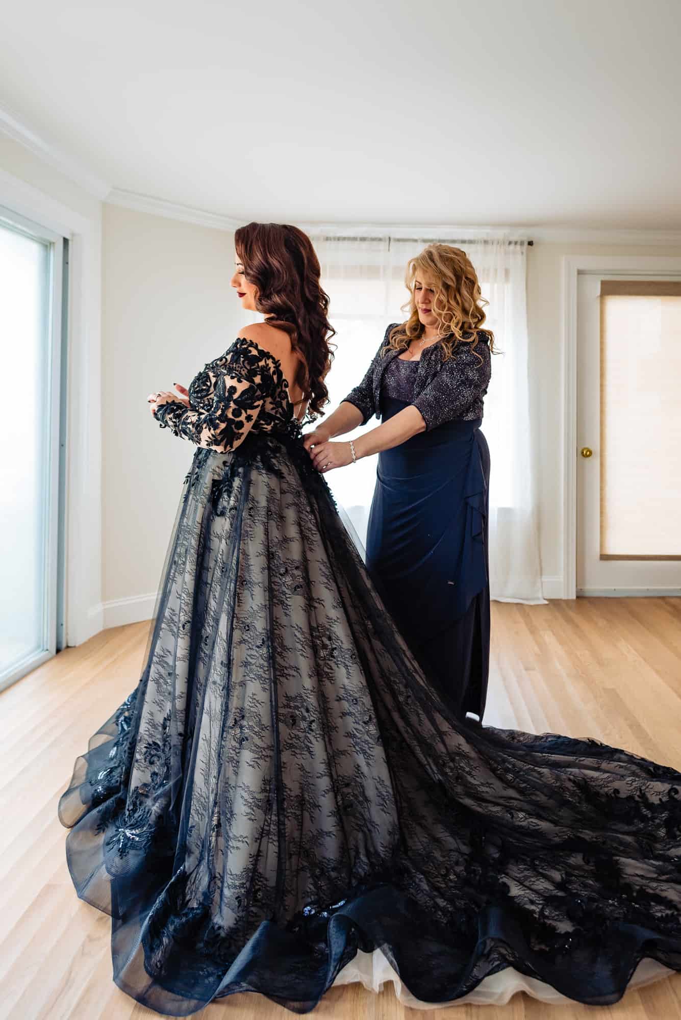 bride and her mother getting ready for the Halloween-themed wedding