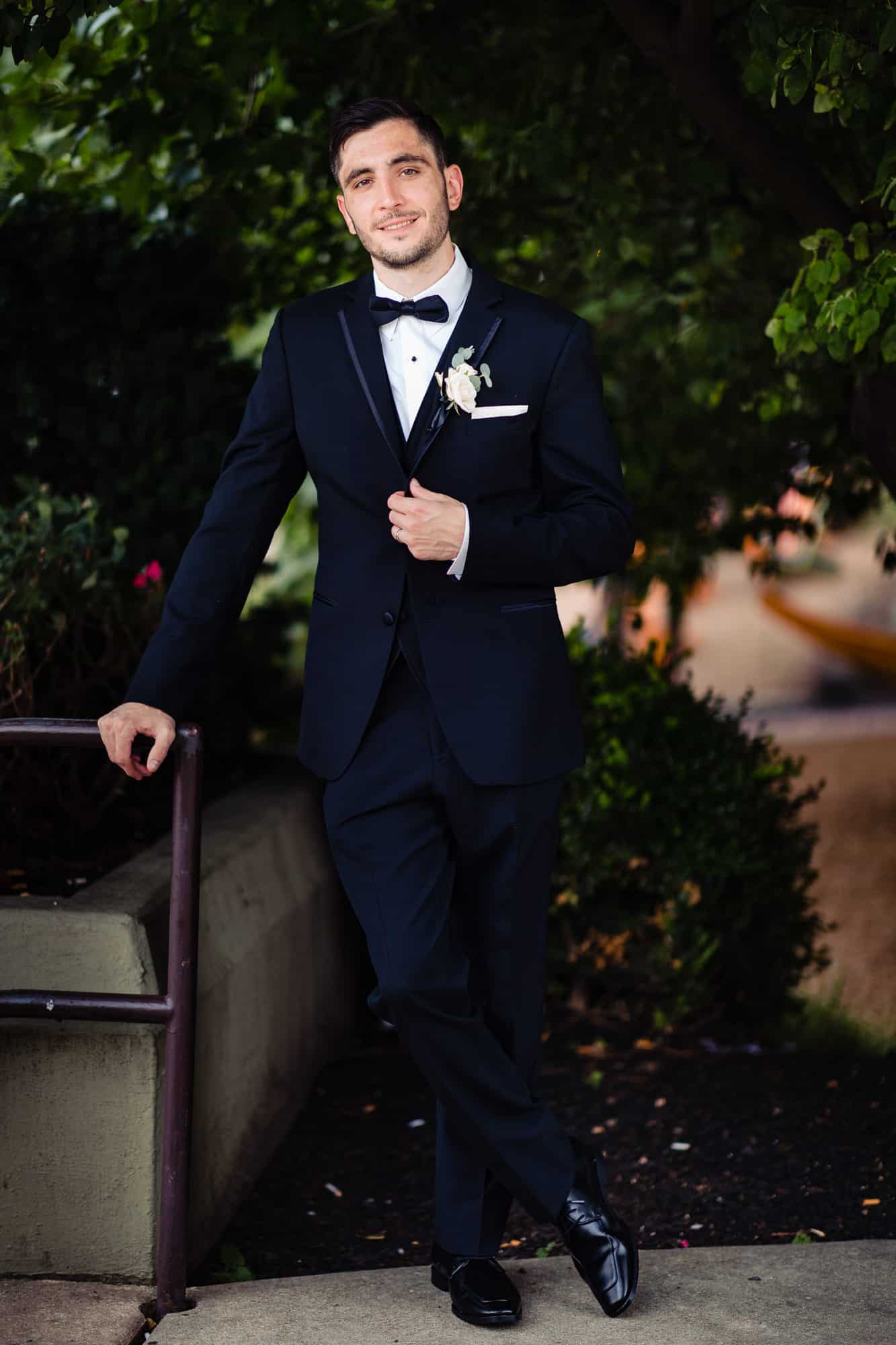 solo shot of the smiling groom