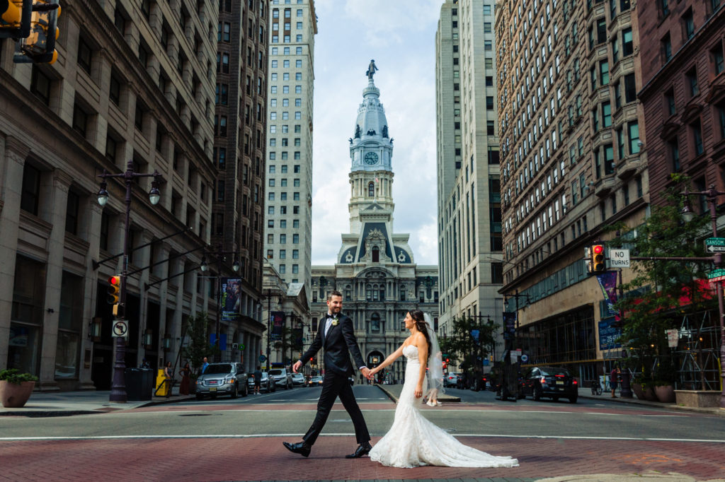 couple walking in the middle of the street